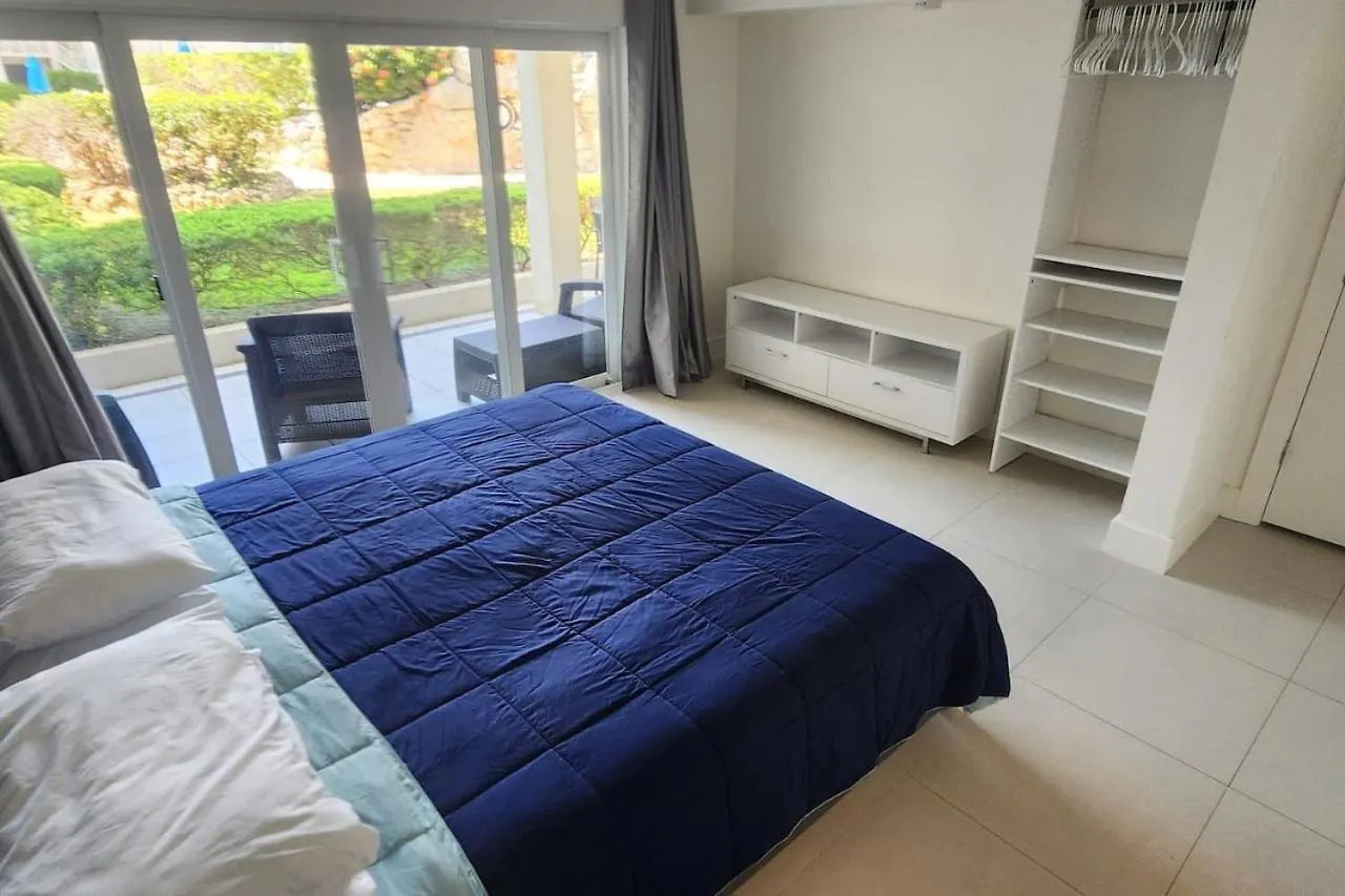 Апартаменты 119 Condo Sunset Cove Ocean Pool Seven Mile Beach Джорджтаун