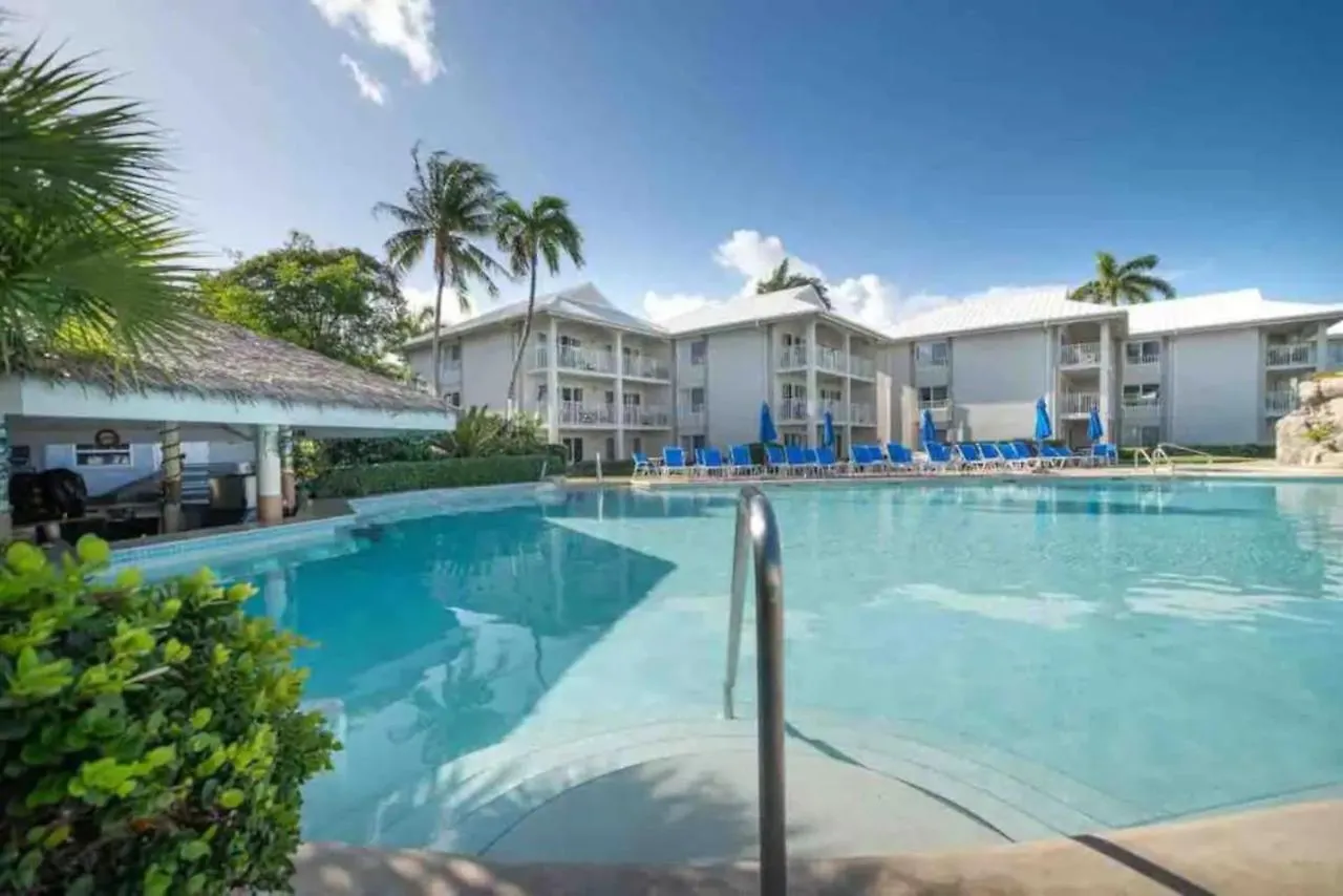 Апартаменты 119 Condo Sunset Cove Ocean Pool Seven Mile Beach Джорджтаун